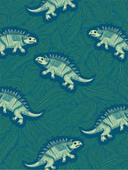 teal dinosaurs among green foliage Rug