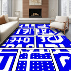 Bold Blue Geometric Text Collage Rug